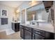 A bathroom featuring double sinks, granite countertops, and a shower at 106 Sago Ct, Summerville, SC 29486
