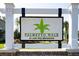 Elegant community sign for Palmetto Walk at Cane Bay Plantation creating a welcoming entrance and highlighting neighborhood pride at 106 Sago Ct, Summerville, SC 29486