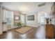 Elegant dining room with hardwood floors, natural light, chandelier, and wall decor at 106 Sago Ct, Summerville, SC 29486