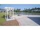 Outdoor community area features a firepit with seating and a pond at 106 Sago Ct, Summerville, SC 29486