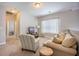 Relaxing loft space with a sofa, armchair, and soft carpet, perfect for lounging at 106 Sago Ct, Summerville, SC 29486