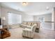 Cozy loft area with comfortable seating and natural light from the windows at 106 Sago Ct, Summerville, SC 29486