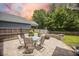 Outdoor patio with brick pavers, patio furniture, and a fire pit at 106 Sago Ct, Summerville, SC 29486