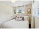 Bedroom features white bedding, curtains, and neutral paint at 1107 S Shadow Dr, Mount Pleasant, SC 29464