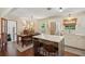 Bright kitchen with an island, stainless steel appliances, and wood floors at 1107 S Shadow Dr, Mount Pleasant, SC 29464