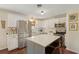 Spacious kitchen with a center island, stainless steel appliances, and ample cabinet storage at 1107 S Shadow Dr, Mount Pleasant, SC 29464