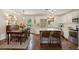 Open-concept kitchen with island seating and adjoining dining area at 1107 S Shadow Dr, Mount Pleasant, SC 29464