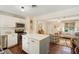 Open kitchen with white cabinets, stainless steel appliances, and a center island at 1107 S Shadow Dr, Mount Pleasant, SC 29464