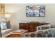 Living room with a decorative cabinet, wood floors, and comfortable furnishings at 1107 S Shadow Dr, Mount Pleasant, SC 29464