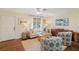 Cozy living room featuring hardwood floors, comfortable seating, and natural light at 1107 S Shadow Dr, Mount Pleasant, SC 29464