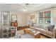 Bright and airy living room with stylish decor and hardwood floors at 1107 S Shadow Dr, Mount Pleasant, SC 29464