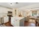 Open floor plan showcasing a modern kitchen with an island flowing into a cozy living area at 1107 S Shadow Dr, Mount Pleasant, SC 29464
