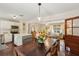 Bright living space seamlessly connects the modern kitchen, dining area, and cozy living room at 1107 S Shadow Dr, Mount Pleasant, SC 29464
