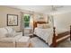 Inviting main bedroom with a king bed, ceiling fan, windows with lots of natural light and hardwood floors at 1107 S Shadow Dr, Mount Pleasant, SC 29464
