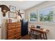 Cozy office space with hardwood floors, wood desk and chair, and natural light at 1107 S Shadow Dr, Mount Pleasant, SC 29464
