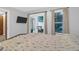 Bedroom with door to deck and backyard views at 112 Fox Chase Dr, Goose Creek, SC 29445
