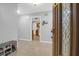 Inviting entryway featuring tile flooring, a shoe bench, and a view of the kitchen at 112 Fox Chase Dr, Goose Creek, SC 29445