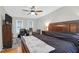 Spacious main bedroom with two windows and ceiling fan at 112 Fox Chase Dr, Goose Creek, SC 29445
