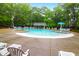 Large community pool with ample seating and shaded areas for residents to enjoy at 112 Fox Chase Dr, Goose Creek, SC 29445
