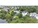Breathtaking aerial view of a charming neighborhood, lush greenery, and a scenic pond at 1225 Blakeway St # 906, Charleston, SC 29492