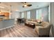 Inviting living space with natural light, stylish furnishings, and wood-look floors at 1225 Blakeway St # 906, Charleston, SC 29492