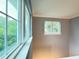 Bright stairway with large windows offering natural light and green views at 1225 Blakeway St # 906, Charleston, SC 29492