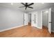 Bedroom featuring hardwood floors, ceiling fan, and doorways leading to other rooms at 1248 Sumner Ave, North Charleston, SC 29406