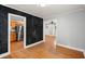 Dining area featuring hardwood floors with views of kitchen and front door at 1248 Sumner Ave, North Charleston, SC 29406