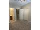 Neutral bedroom boasts an ensuite bathroom and double door closet for maximum space at 126 Woodward Rd, Goose Creek, SC 29445