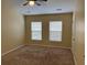 Bedroom features carpet, two windows for natural lighting, and neutral walls at 126 Woodward Rd, Goose Creek, SC 29445