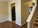 Bright entryway featuring vinyl wood flooring that offers a view into an adjacent kitchen at 126 Woodward Rd, Goose Creek, SC 29445