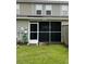 Back porch with screen door and outside hose at 126 Woodward Rd, Goose Creek, SC 29445