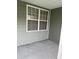 Window on back patio featuring green siding at 126 Woodward Rd, Goose Creek, SC 29445