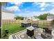 Backyard patio with outdoor furniture and hot tub, perfect for relaxation and entertaining at 1301 Wild Goose Trl, Summerville, SC 29483