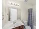 Bathroom with a vanity and mirror, toilet, and shower with curtain at 1301 Wild Goose Trl, Summerville, SC 29483