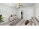 Nicely staged bedroom showing ceiling fan, closet, plush bed and neutral color palette at 1301 Wild Goose Trl, Summerville, SC 29483