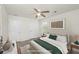 Cozy bedroom features neutral decor, ceiling fan and a large bed with matching nightstands at 1301 Wild Goose Trl, Summerville, SC 29483