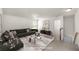 Spacious living room with plush seating, large windows, and open layout at 1301 Wild Goose Trl, Summerville, SC 29483