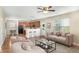 Bright living room open to the kitchen, complete with hardwood floors, neutral paint, and an open layout at 1301 Wild Goose Trl, Summerville, SC 29483