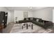 Bright living room featuring a large, comfortable sectional sofa and stylish decor at 1301 Wild Goose Trl, Summerville, SC 29483