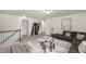 Bright living room featuring a large, comfortable sectional sofa and stylish decor at 1301 Wild Goose Trl, Summerville, SC 29483