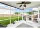 Well-lit screened porch overlooking a fenced backyard, offering a peaceful retreat at 1301 Wild Goose Trl, Summerville, SC 29483