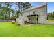 Backyard with a second story deck, stairs, and lots of room for activities at 142 Maxwell Rd, Summerville, SC 29483