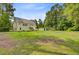 Expansive backyard with lots of room and an upper deck at the back of the house at 142 Maxwell Rd, Summerville, SC 29483