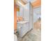 Cozy bathroom featuring a vanity with storage and view into a long hallway at 142 Maxwell Rd, Summerville, SC 29483