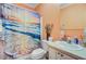 Bathroom with sunrise designed shower curtains, vanity, and toilet at 142 Maxwell Rd, Summerville, SC 29483