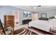 Primary bedroom with nice wood furniture and access to primary bath at 142 Maxwell Rd, Summerville, SC 29483