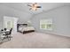 Spacious bedroom with a ceiling fan, natural light, and a dedicated workspace at 142 Maxwell Rd, Summerville, SC 29483