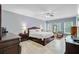 Spacious bedroom with ceiling fan, and neutral tile flooring and paint at 142 Maxwell Rd, Summerville, SC 29483