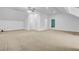 Large bonus room with neutral carpet, white walls, and multiple doorways and access points at 142 Maxwell Rd, Summerville, SC 29483